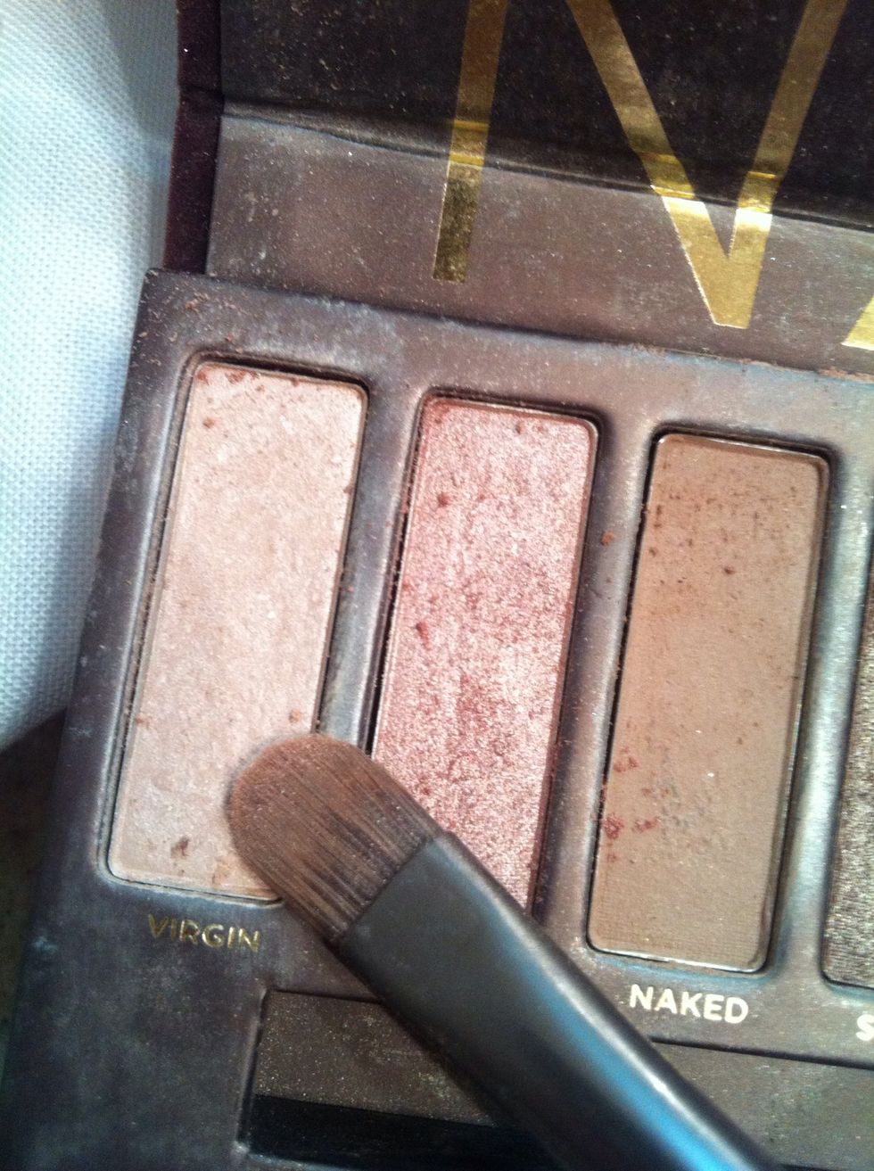 Next I am taking the color virgin and applying it to the inner corner of my eye