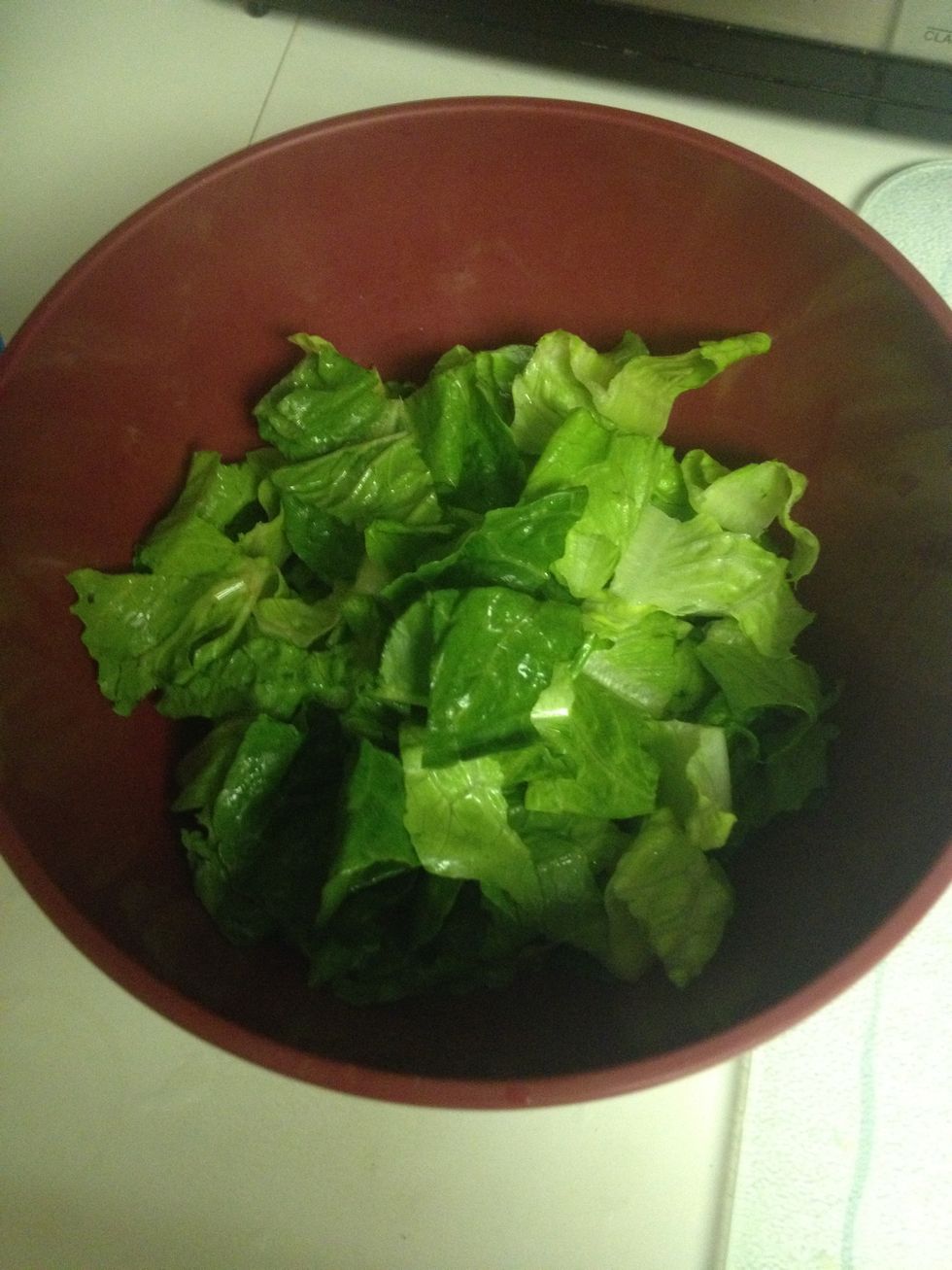 Next I chopped the lettuce up and put it in a bowl while waiting for the onion to cook.