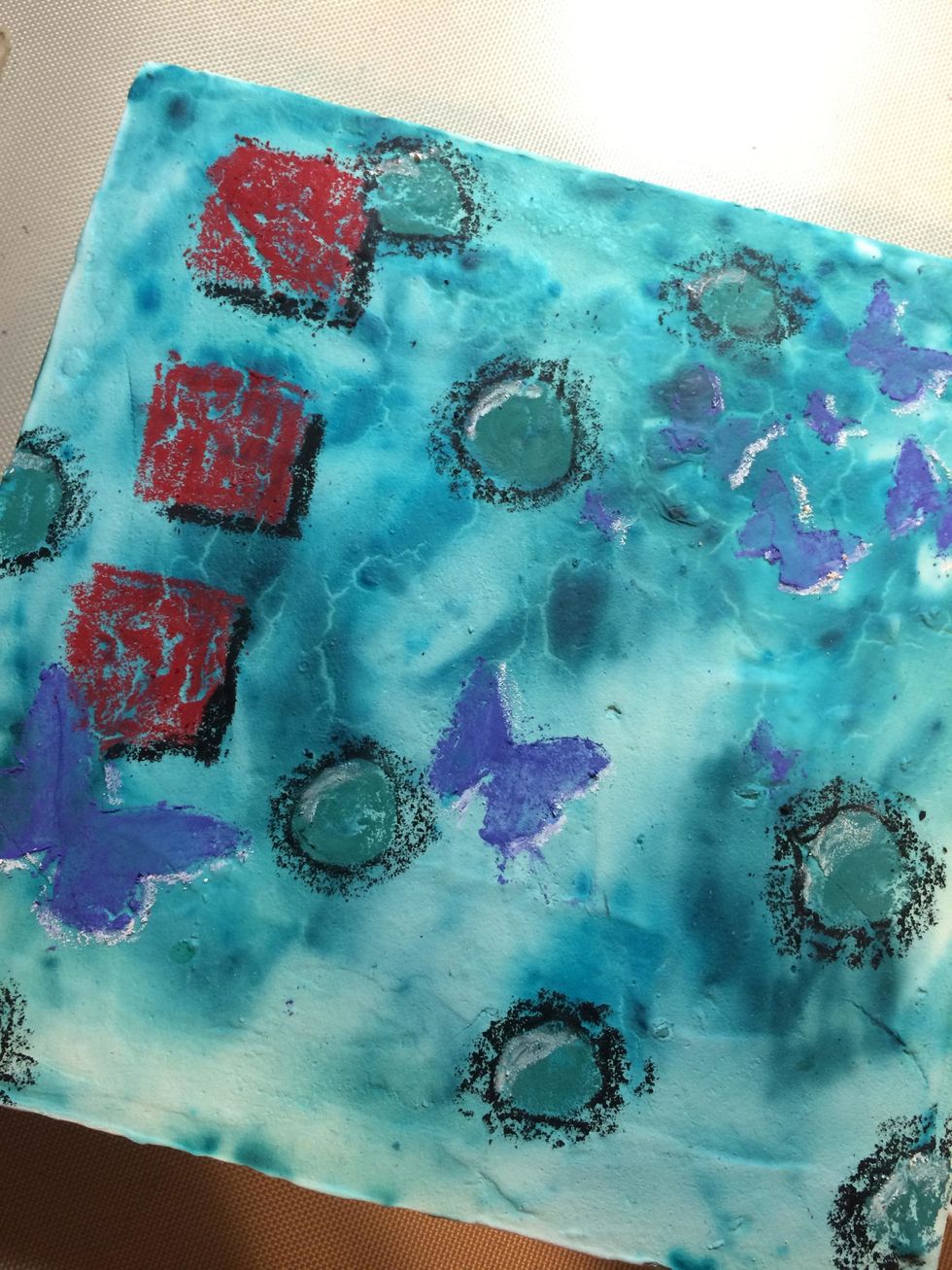 Next I colored on shapes with water soluble crayons. I colored in the butterflies on the Chasing Butterfly stencil.