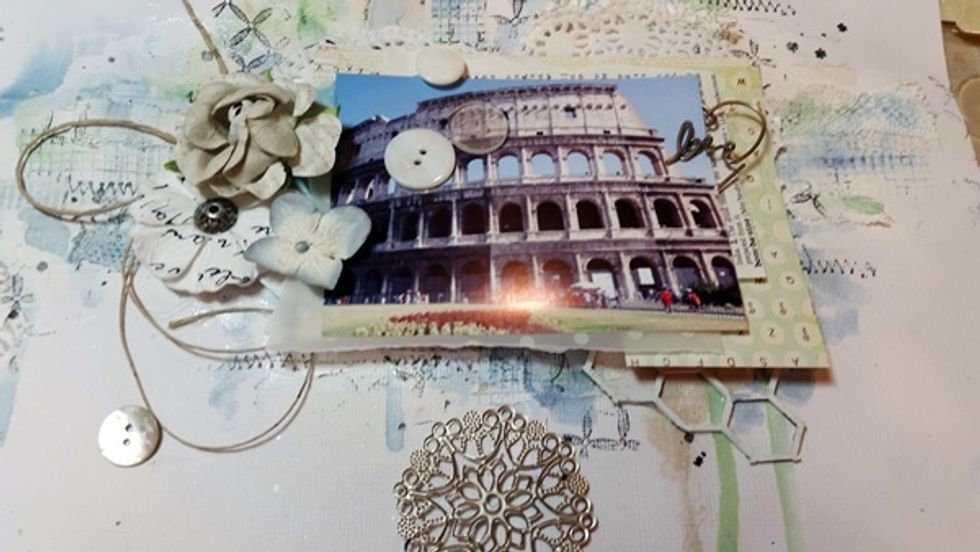 Next I continued to add flowers and bits and pieces