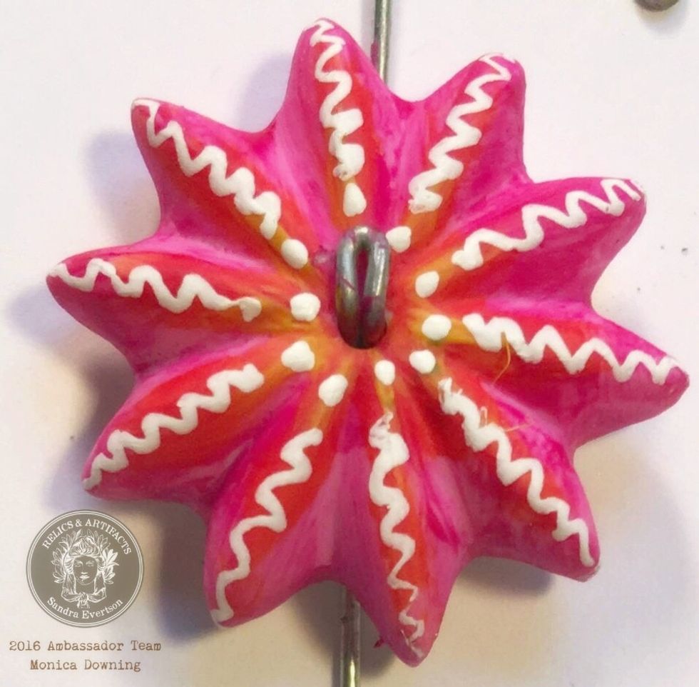 Next I grabbed for my white Signo pen and did some doodling on the flower.