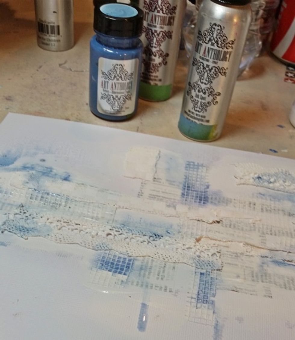 Next I mixed a bit Of Velvet with a few sprays of a coordinating Colorations, using a paintbrush I applied the color to my layout.