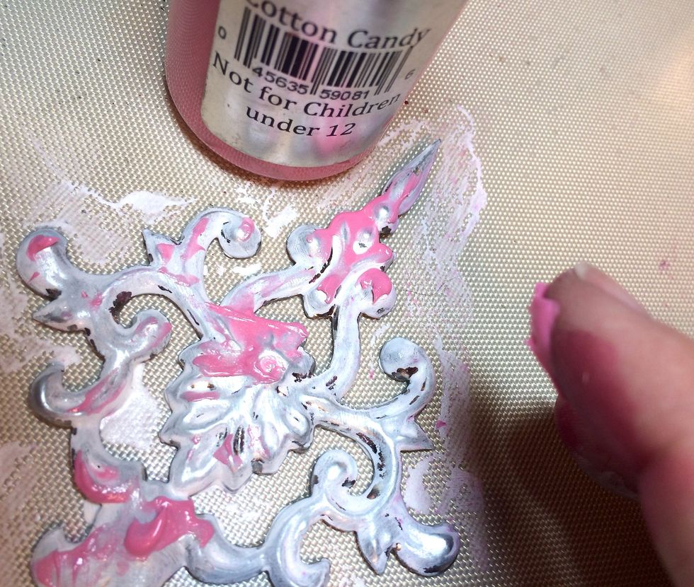 Next, I rub Cotton Candy Velvet onto the medallion.