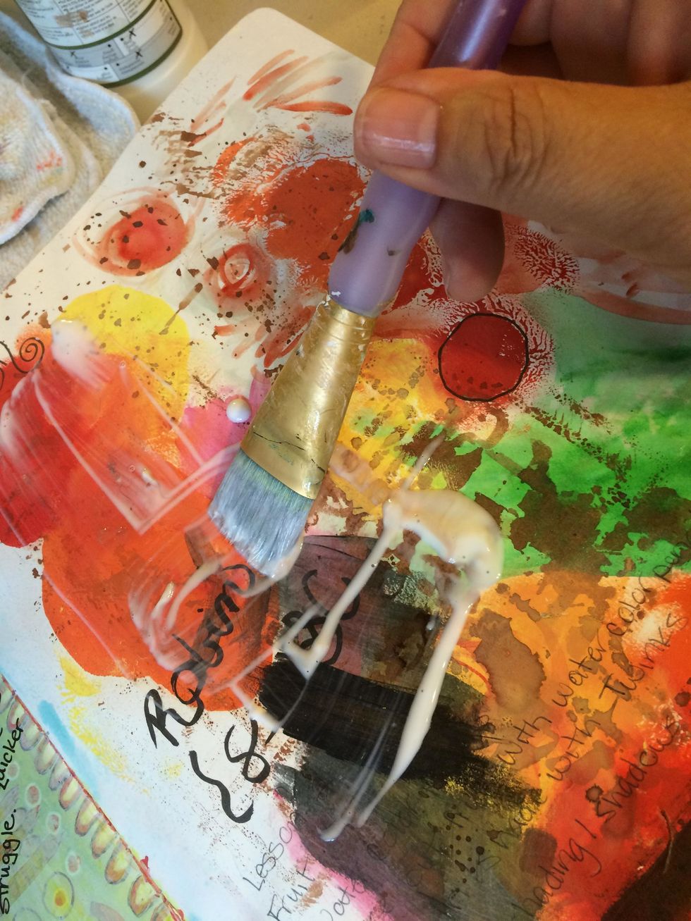 Next, I tore up pieces from my collage stash and started willy-nilly applying them onto my art journal. I used Matte Medium to adhere the collage papers.