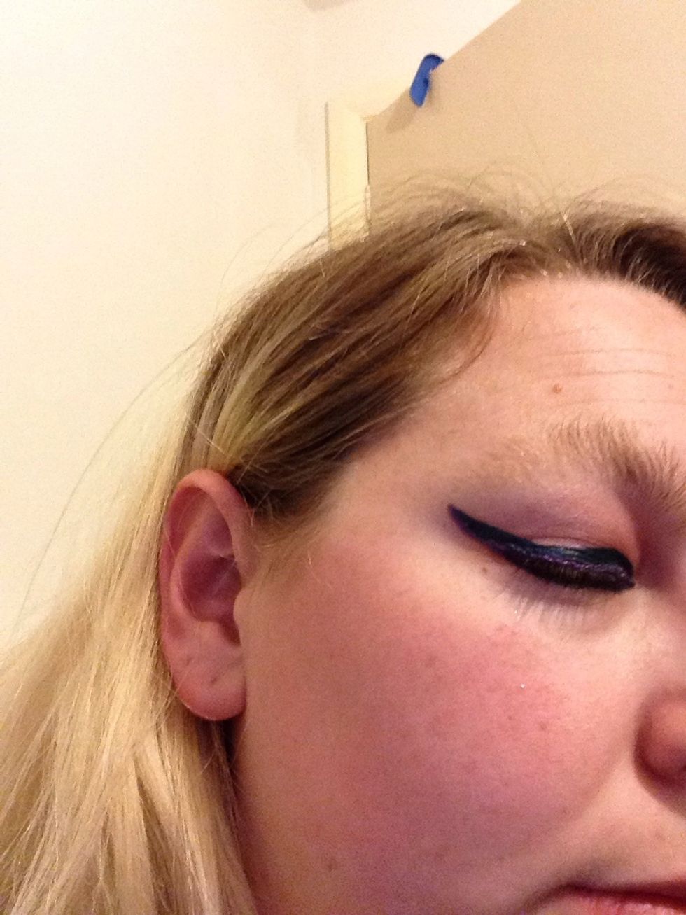 Next I used the Collection felt tip liner in Teal to add over the top of the line of the pencil liner. I enjoyed using this but may take a while to get used to it, it's slightly harder to handle.