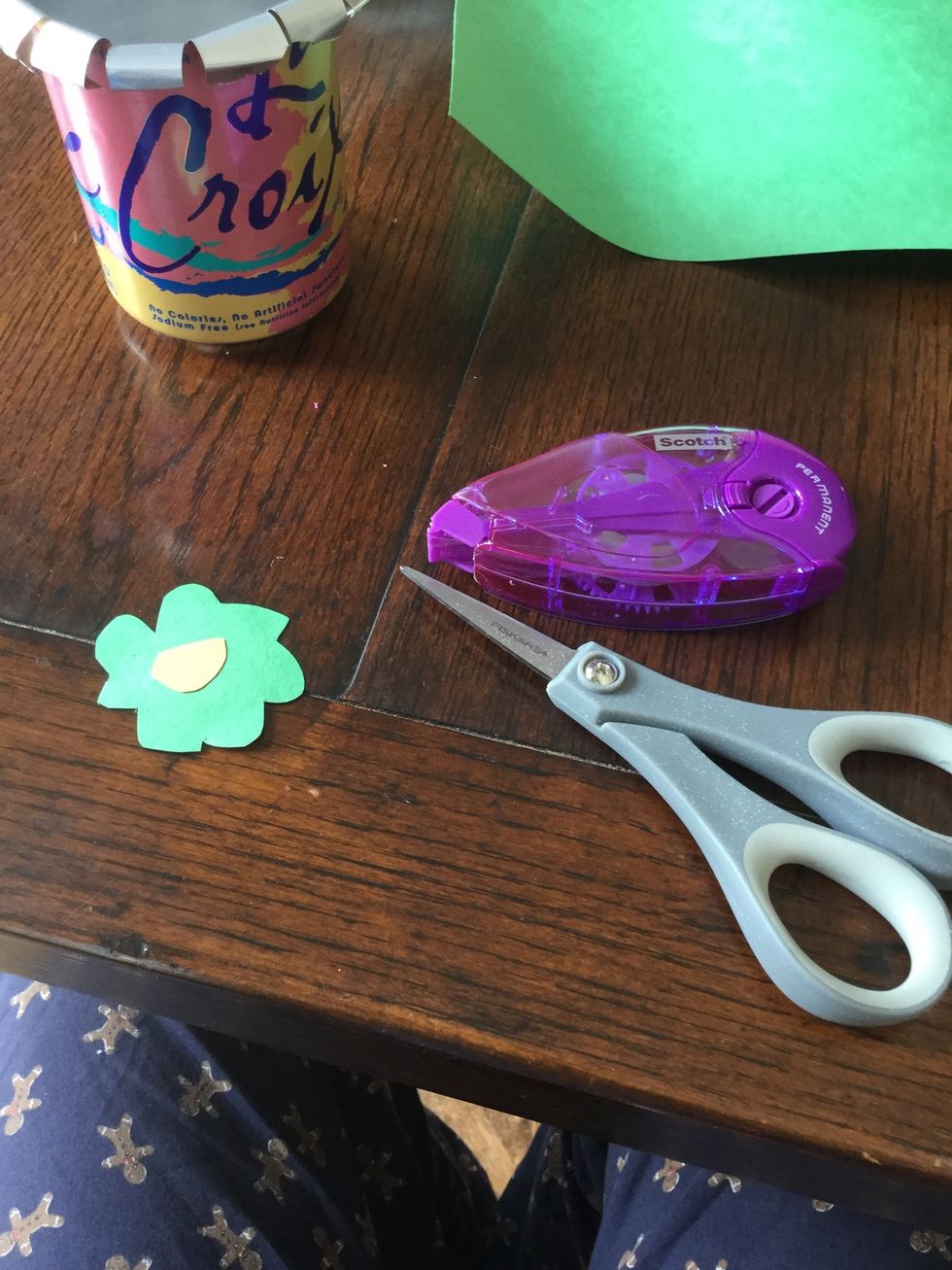 Next if you want to you can make paper flowers to put in the vase, or you can put pencils, kitchen utensils, etc. inside.