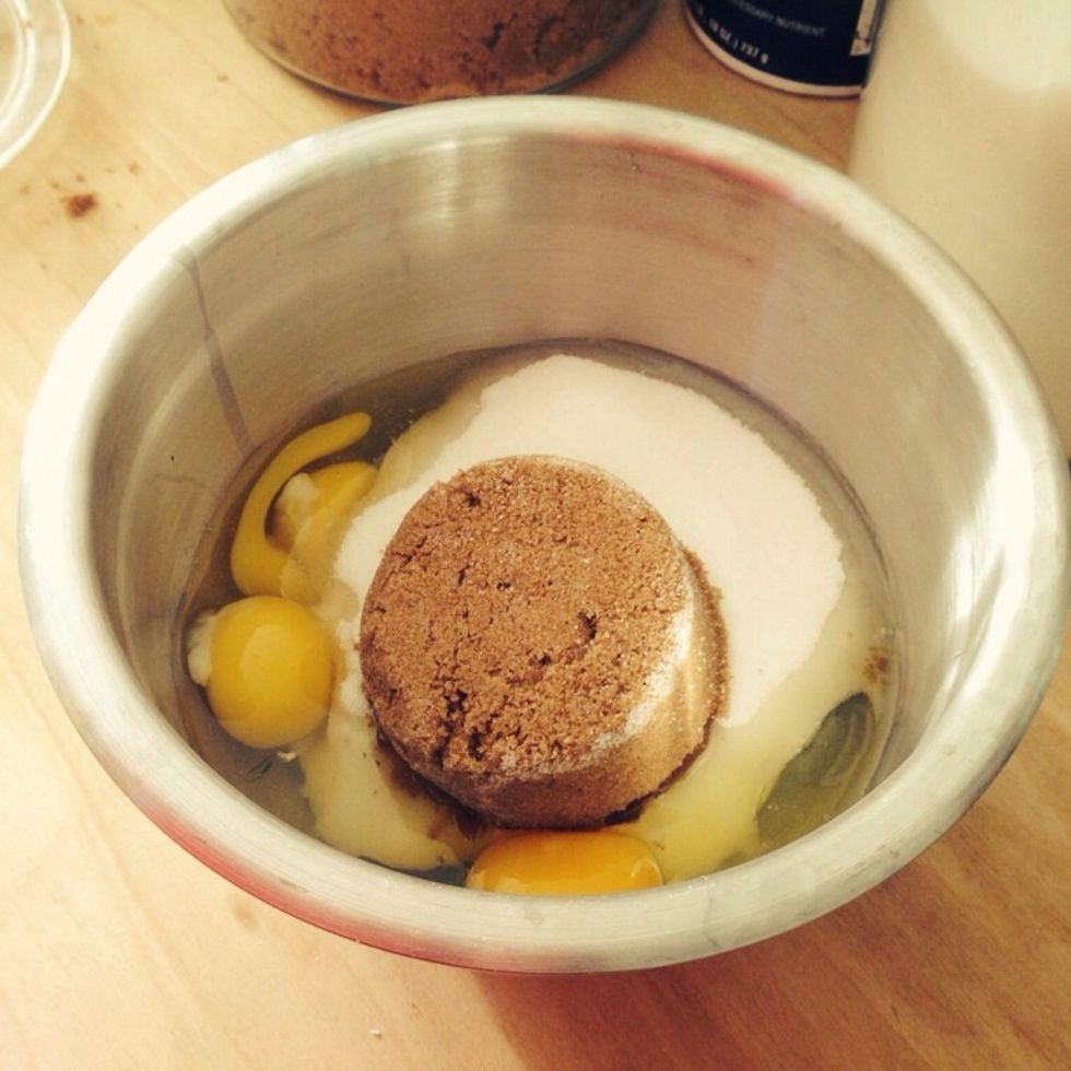 Next in a bowl add 4 eggs, 1.5c sugar and  0.5c brown sugar and mix!