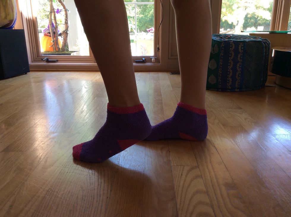 Next is moving your feet. First slide the foot that is flat on the ground backwards.