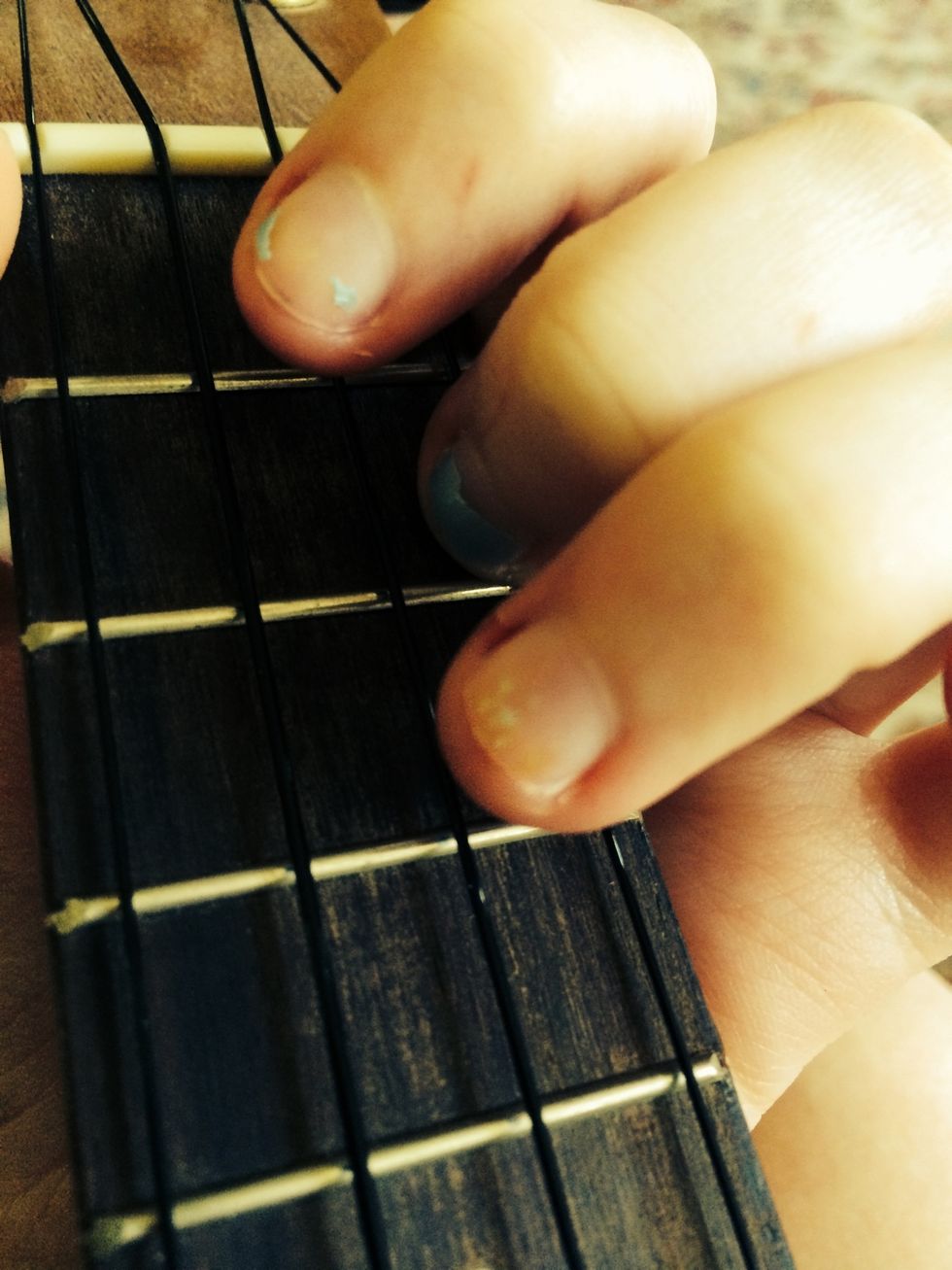 Next is the G chord. Keep your 2nd finger place and lift up the third and first fingers