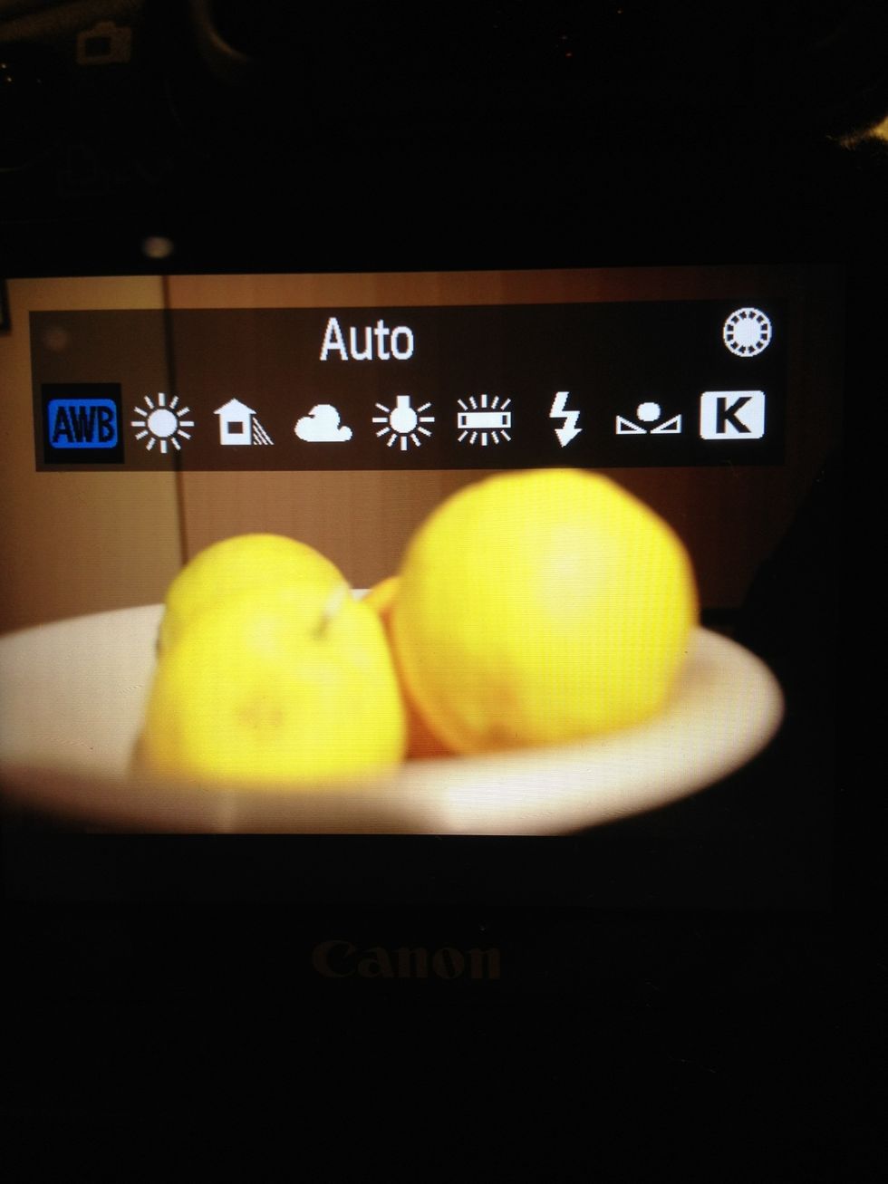 Next is your white balance. This determines how cool (blue) or warm (yellow) your shot is. Setting to 'Auto' is the best bet for beginners.