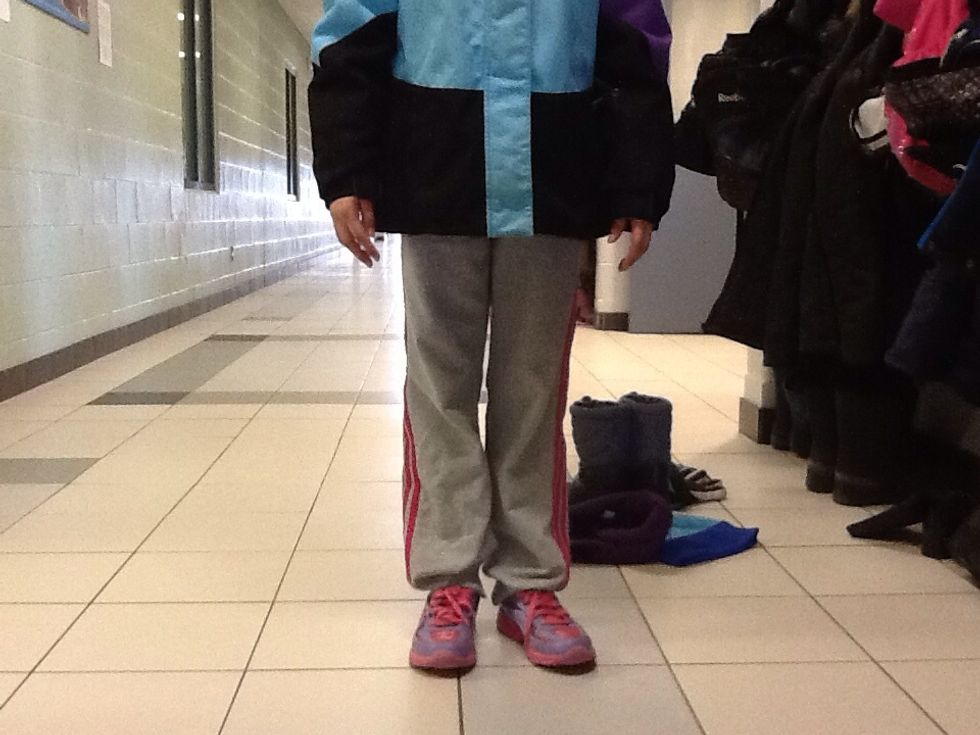 Next, lay on some warm pants so you do not feel cold outside. It is optional to place some snow pants.