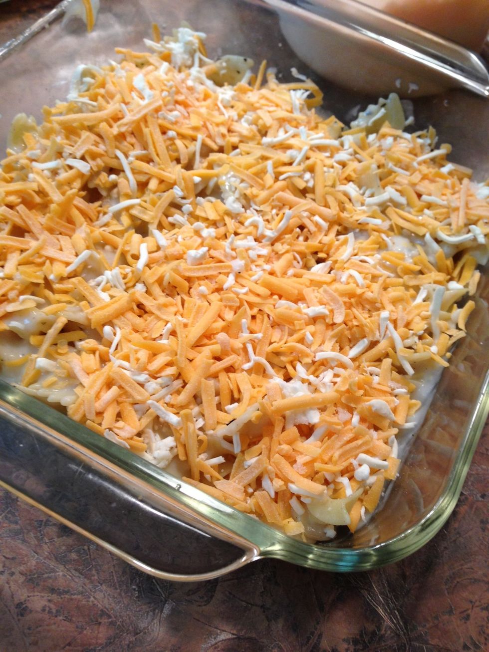 Next layer 1/3 of the cheese. (Today I mixed in some motzerella with cheddar. You can use a mix of Colby jack too. Be creative ... Or simply use up what you have on hand.