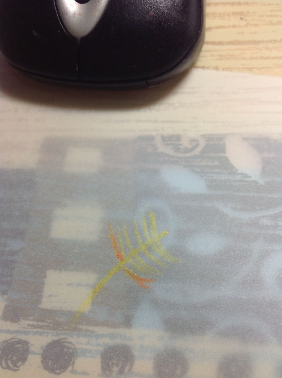 Next, layer the next color on top of the last two strokes on each side.