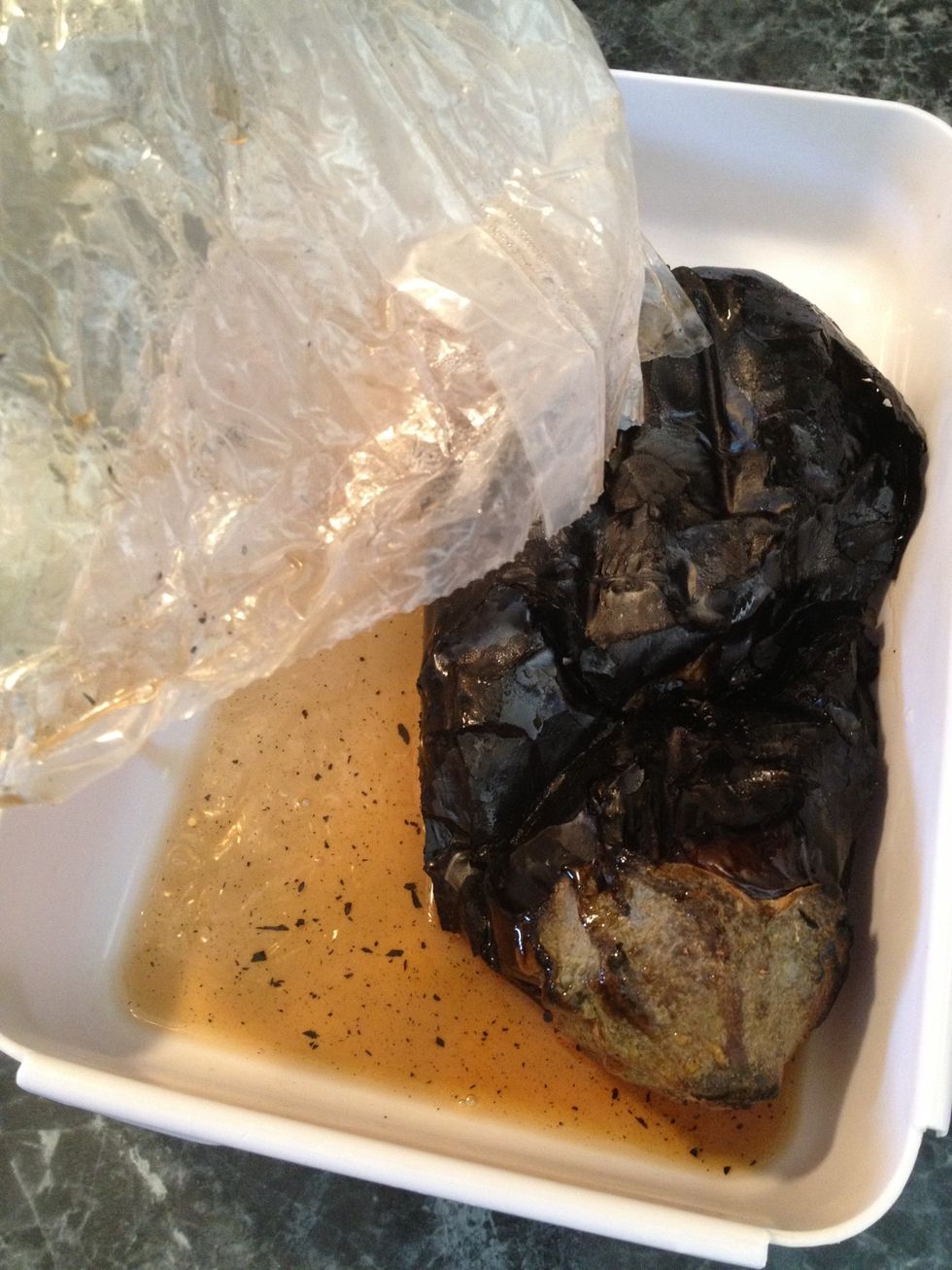 Next, lets remove the blackened skin off the eggplant.