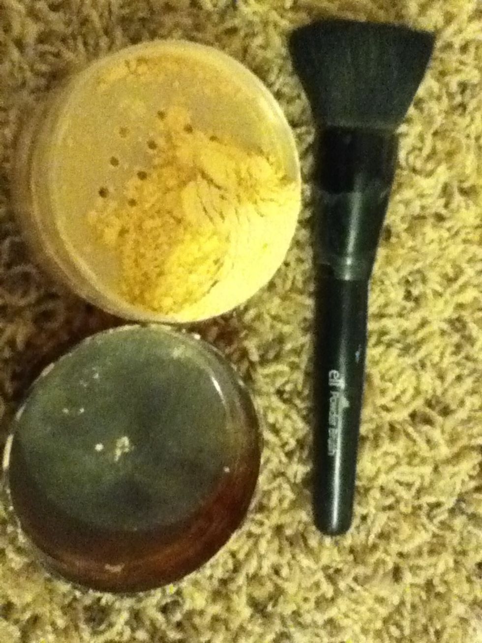 Next, lightly put on a powder. This one is Covergirls professional loose powder.