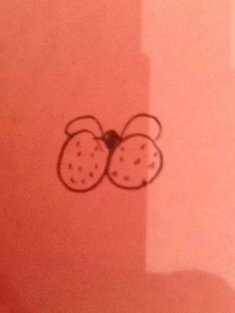 Next make a dark lump as the nose and two short lumps as the eyes