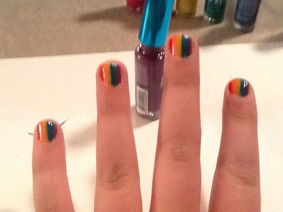 Next make a purple line next to the blue line. Your pinkie finger will probably have no more room for the pink.