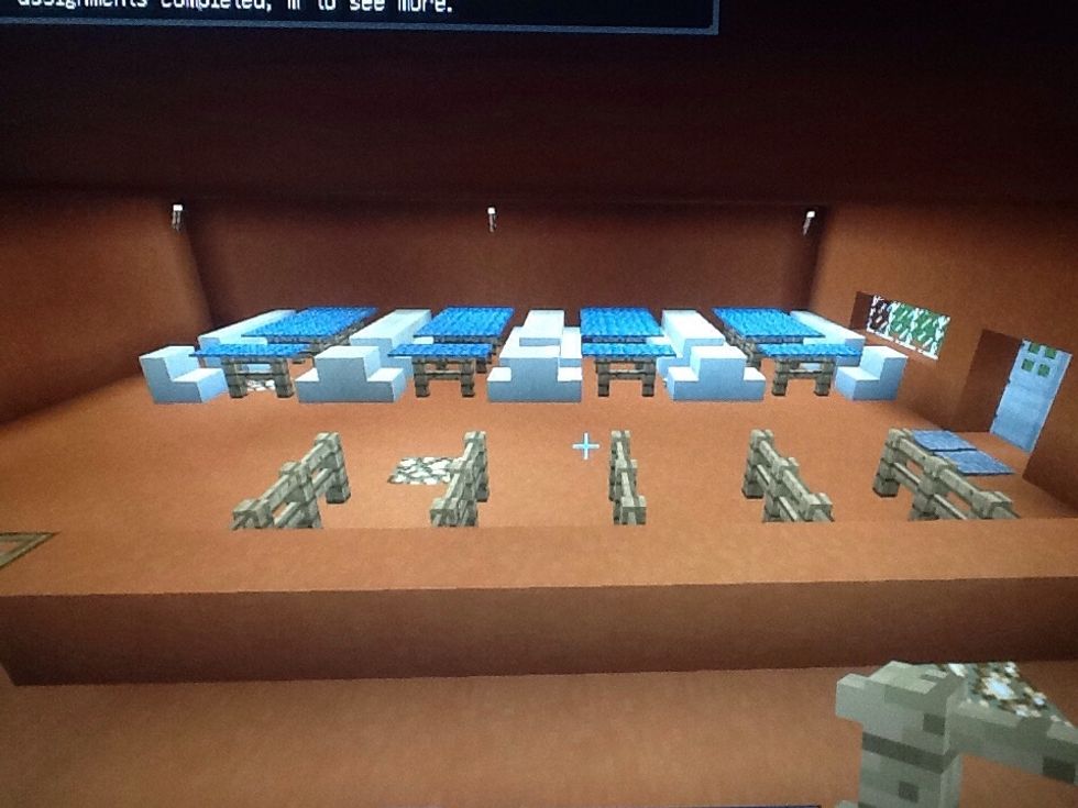 Next make the tables place stairs and fences one the ground with carpet on the fence.