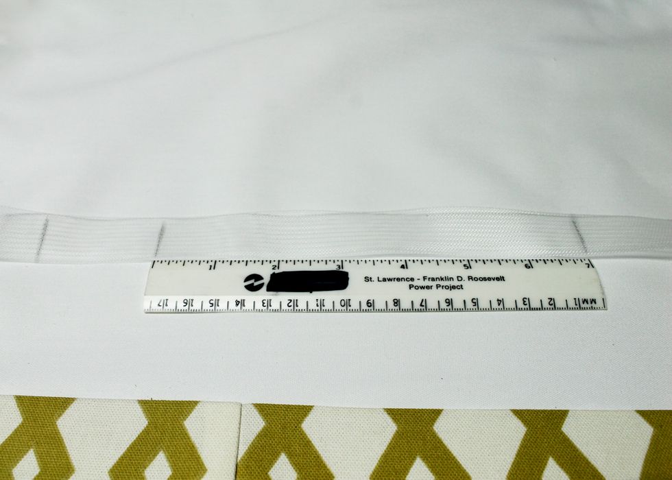 Next mark your tape with a pencil. Mark 1" from the end. Then 2" for the first magnet. Then 6" for the first fold. Then another 2" for the next magnet, then another 6" for the next fold, etc.
