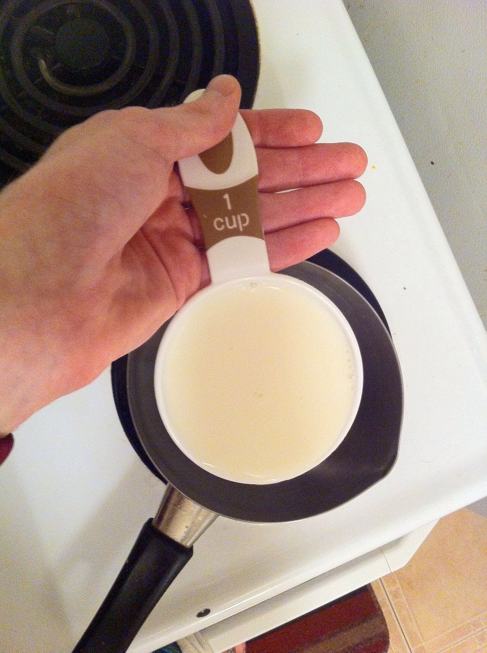 Next, measure one cup of milk and pour into the pot