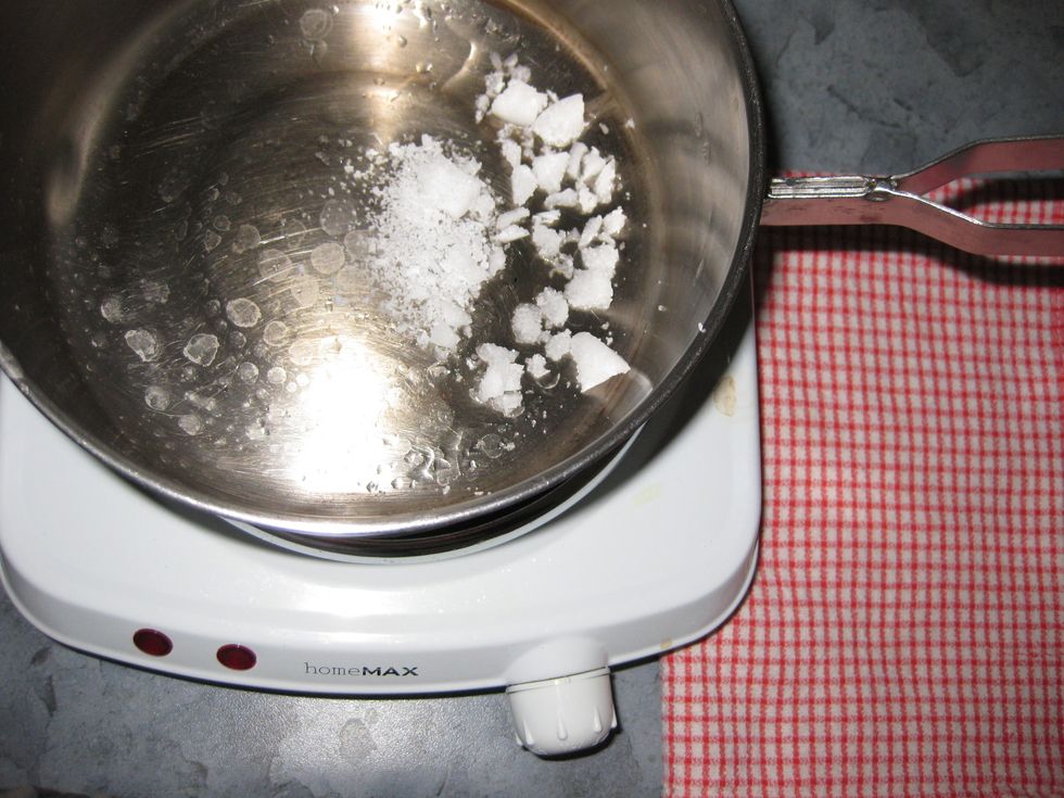 ....next melt wax on stove top with a pan....