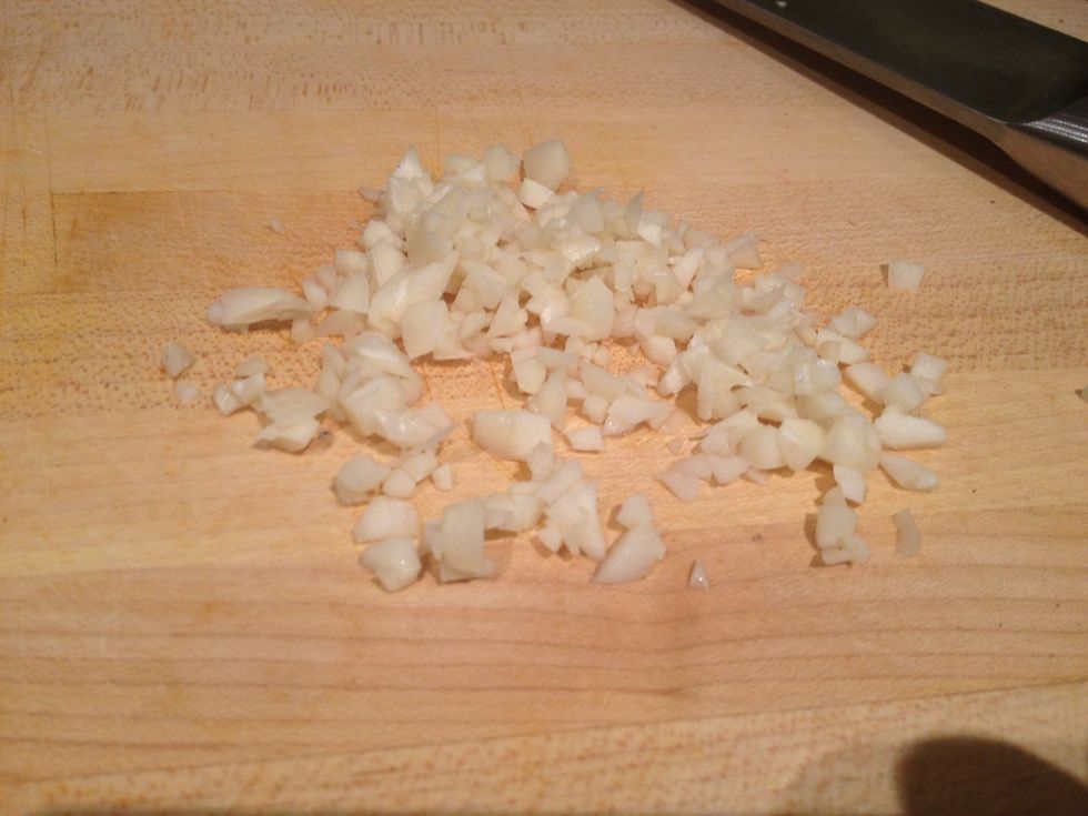 Next, mince the 4 garlic cloves.