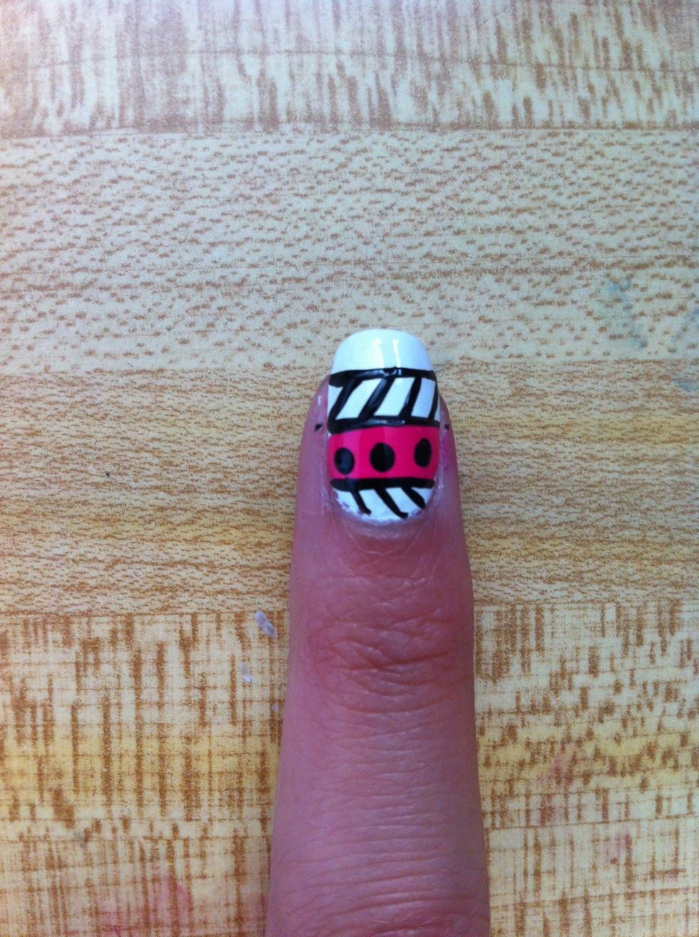 Next, paint a line across like so. And then paint diagonals again. This time you paint it the opposite way you did with the first one.