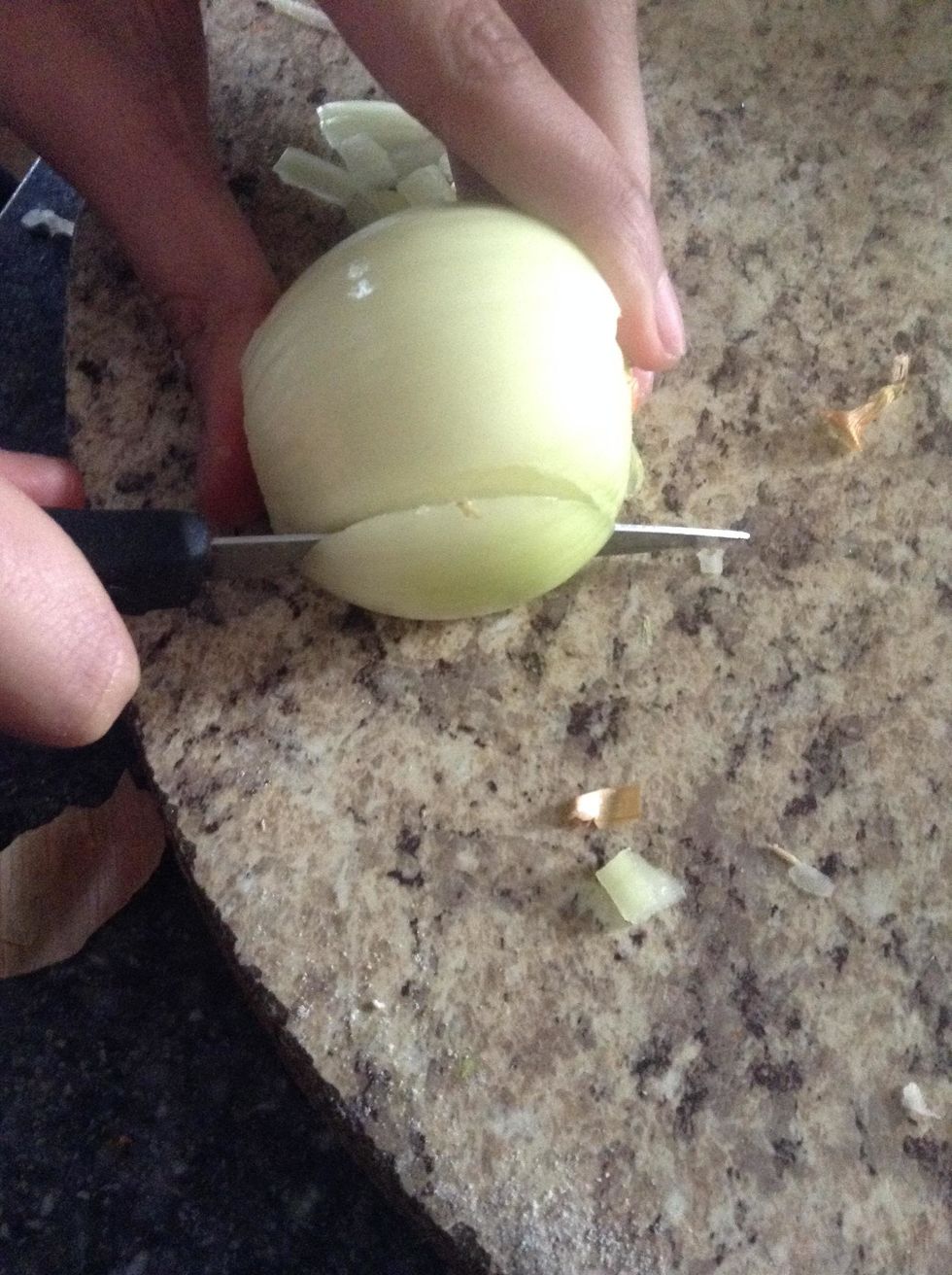 Next, peel and chop half of a medium sized onion.