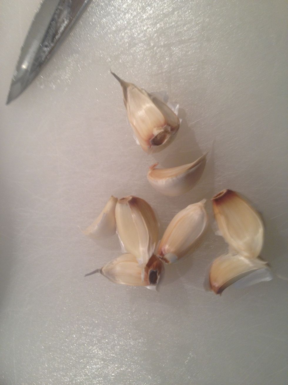 Next, peel your garlic cloves.