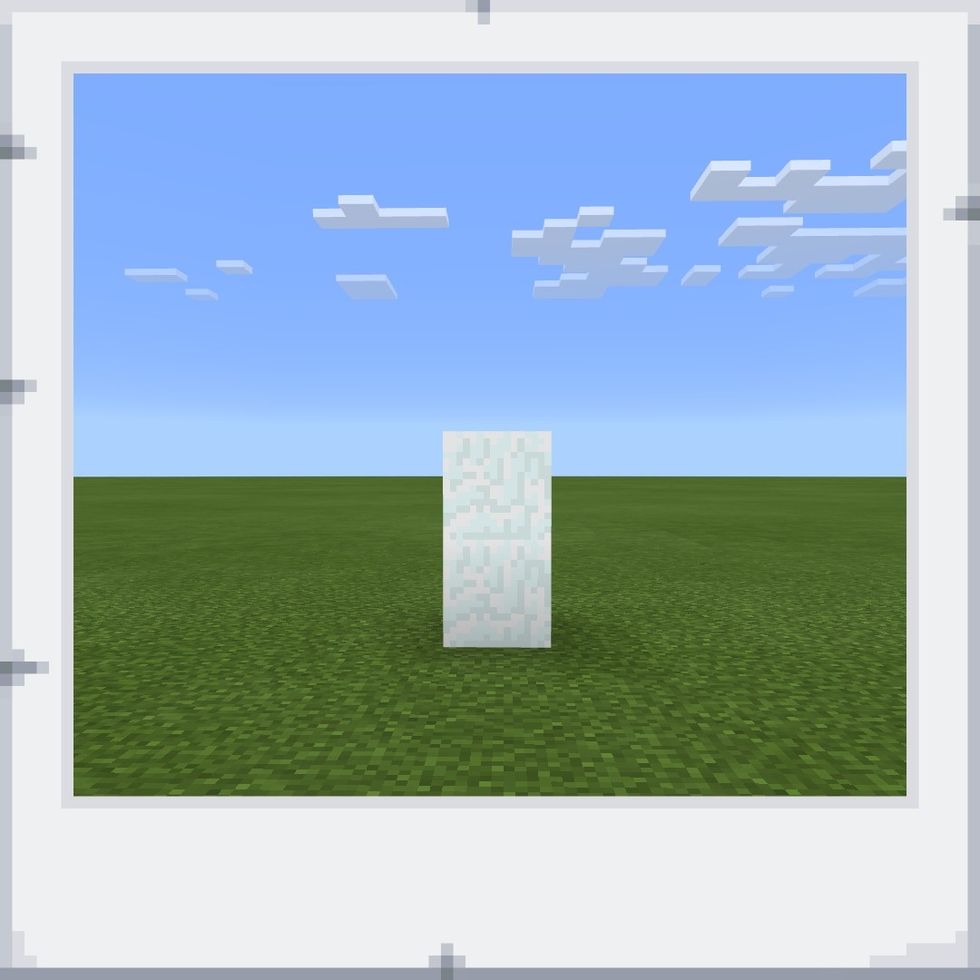 Next, place a block of snow directly on top of the block of snow you placed on step one.