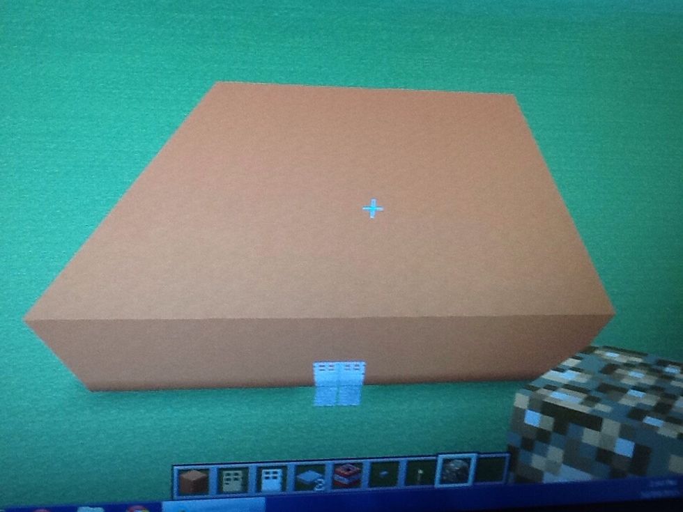 Next place any block to create the roof.