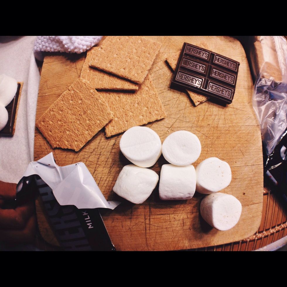 Next, place chocolate bar of top on graham cracker.