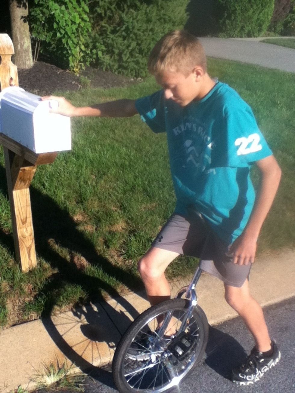 Next, place one foot on the lower pedal.