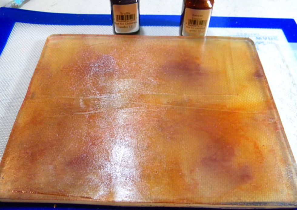 Next, place small dollops of Truffle and Kenyan Copper onto the plate and smooth out with the brayer.  It is not necessary to clean the plate off in between layers as long as the colors are similar.