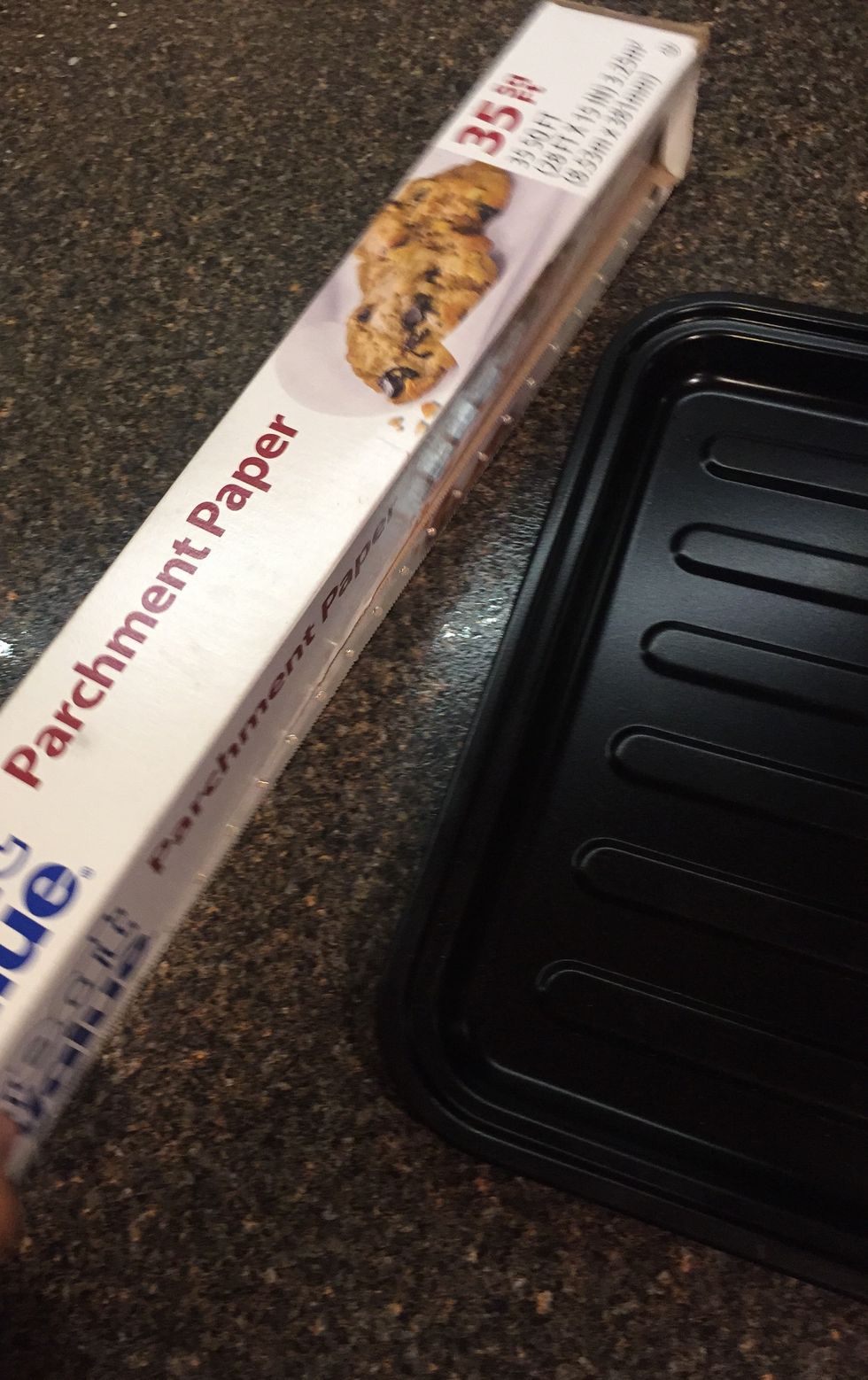 Next, place the parchment paper on the tray being used.