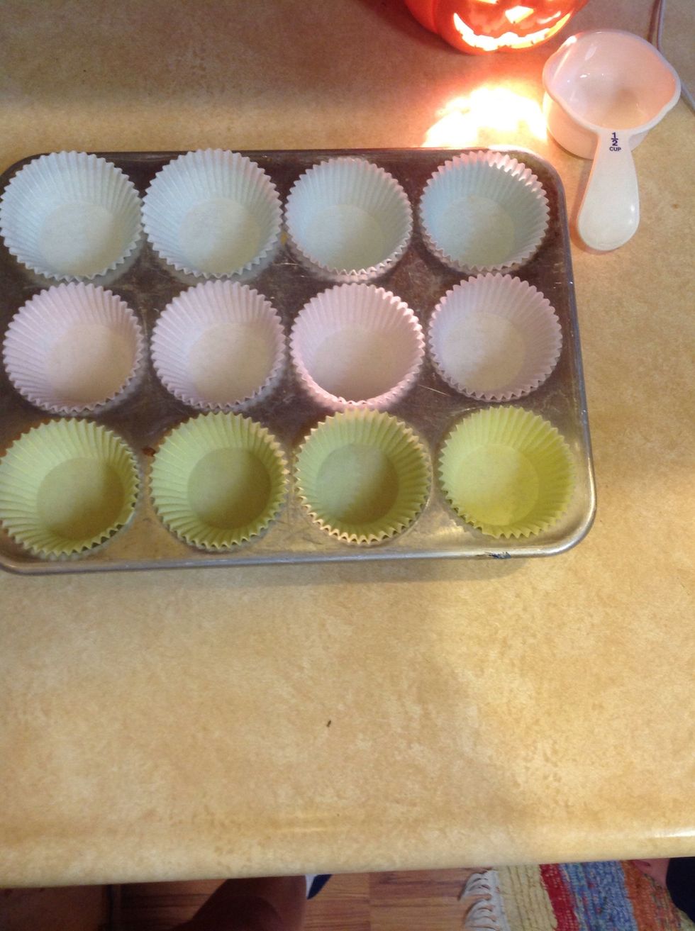 Next , place your cupcake holders in the pan.