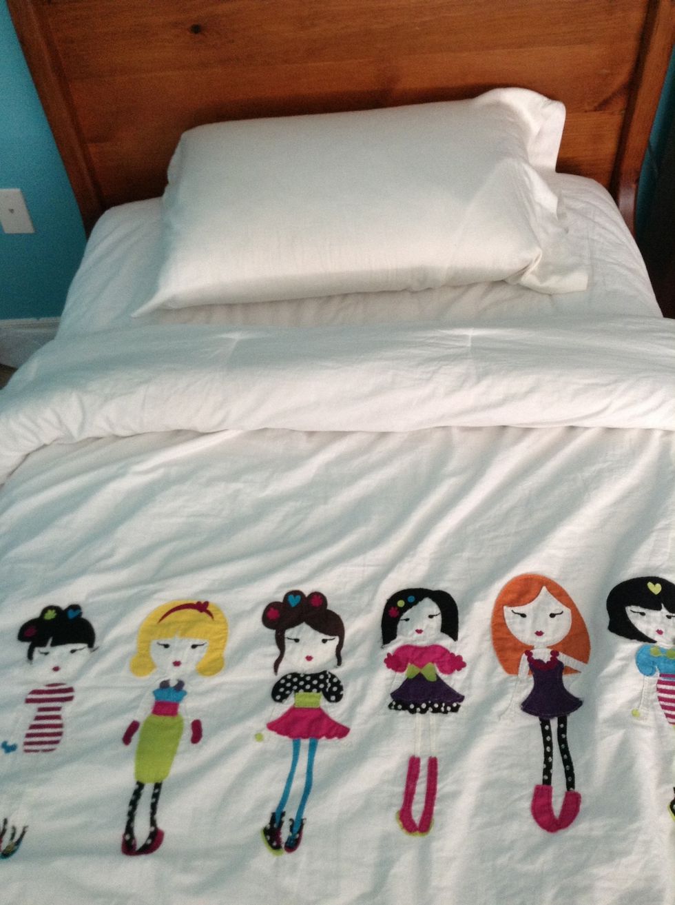 next, place your pillow on the bed and smooth out any wrinkles!