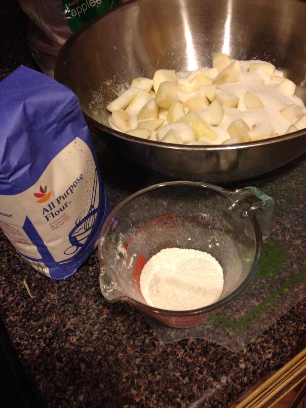 Next, pour 1/4 cup of flour into the measuring cup, then bowl.