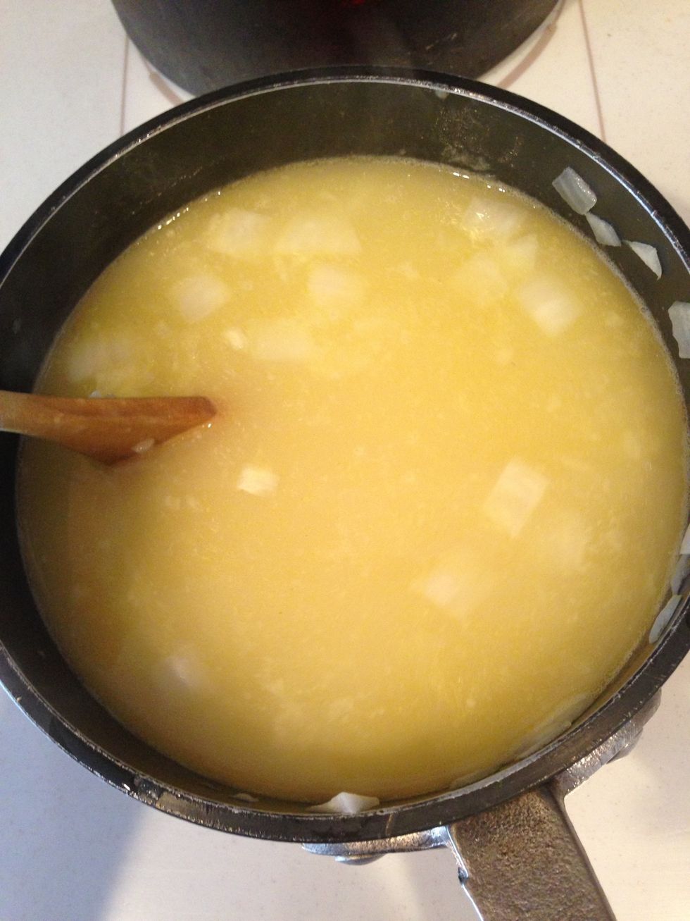 Next pour in the chicken stock.