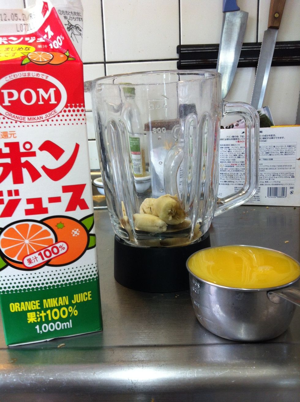 Next, pour in the orange juice and add the eggs. You can also substitute soy milk for the orange juice or go traditional with milk.