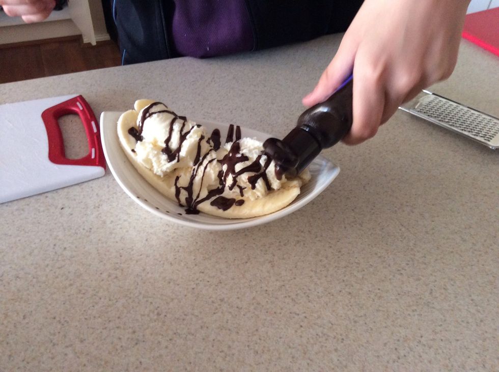 Next pour the Chocolate sauce over the ice cream (decoratively) \ud83d\ude09