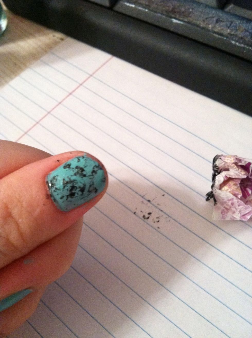 Next, press the candy wrapper down onto your nails creating a marble effect! It probably WILL make a mess around your nail! Do not worry!