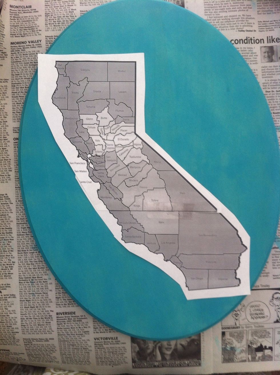 Next print a map of the state you plan to do at the size you need. (I had to split the map into 2 sheets to achieve the correct size.) Then tape it down to your board.