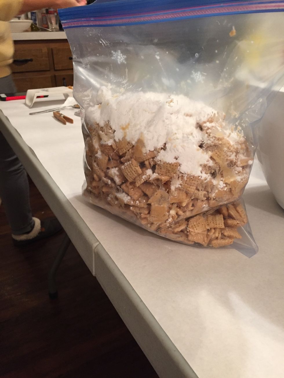 Next, put 1 1/2 cups of confectioners sugar into the bag and make sure you seal the bag tightly!