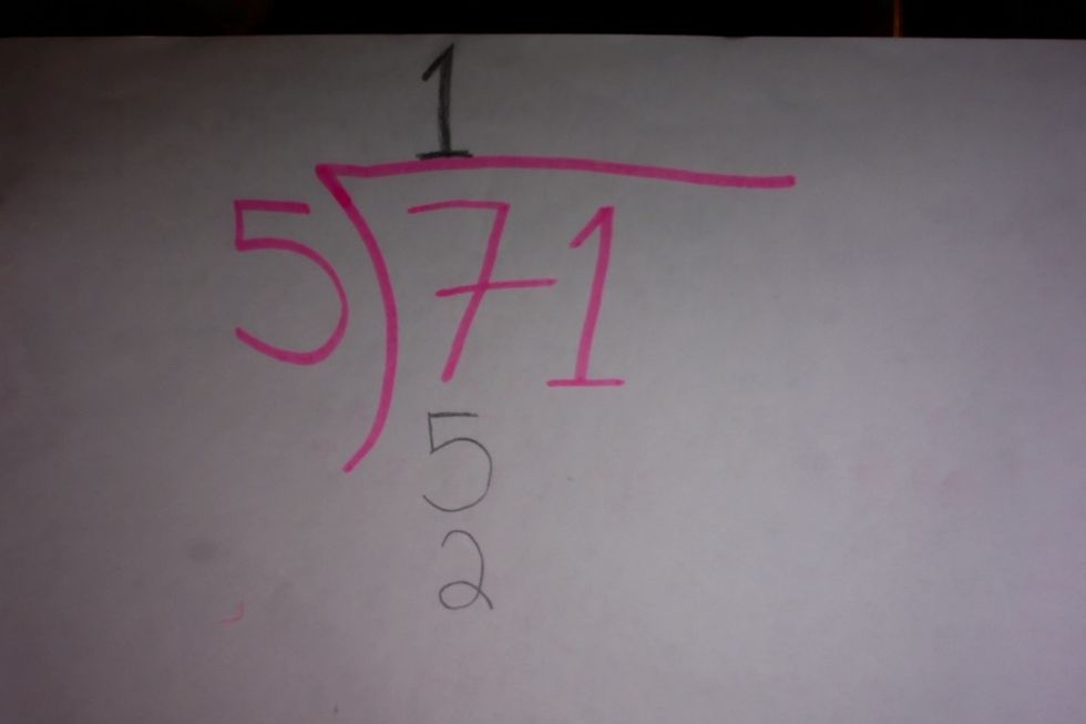 Next,put a 2 underneath the 5 you just added. You are going to do this because 5 goes into 7  once with the remainder of 2.