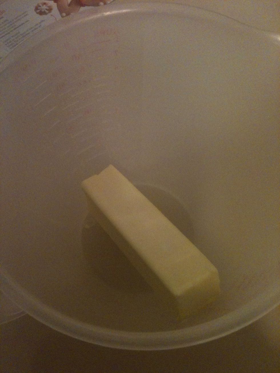 Next put a stick of butter in a mixing bowl