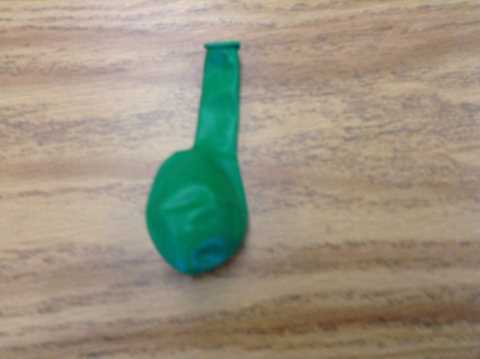 Next, put chocolate inside balloon.