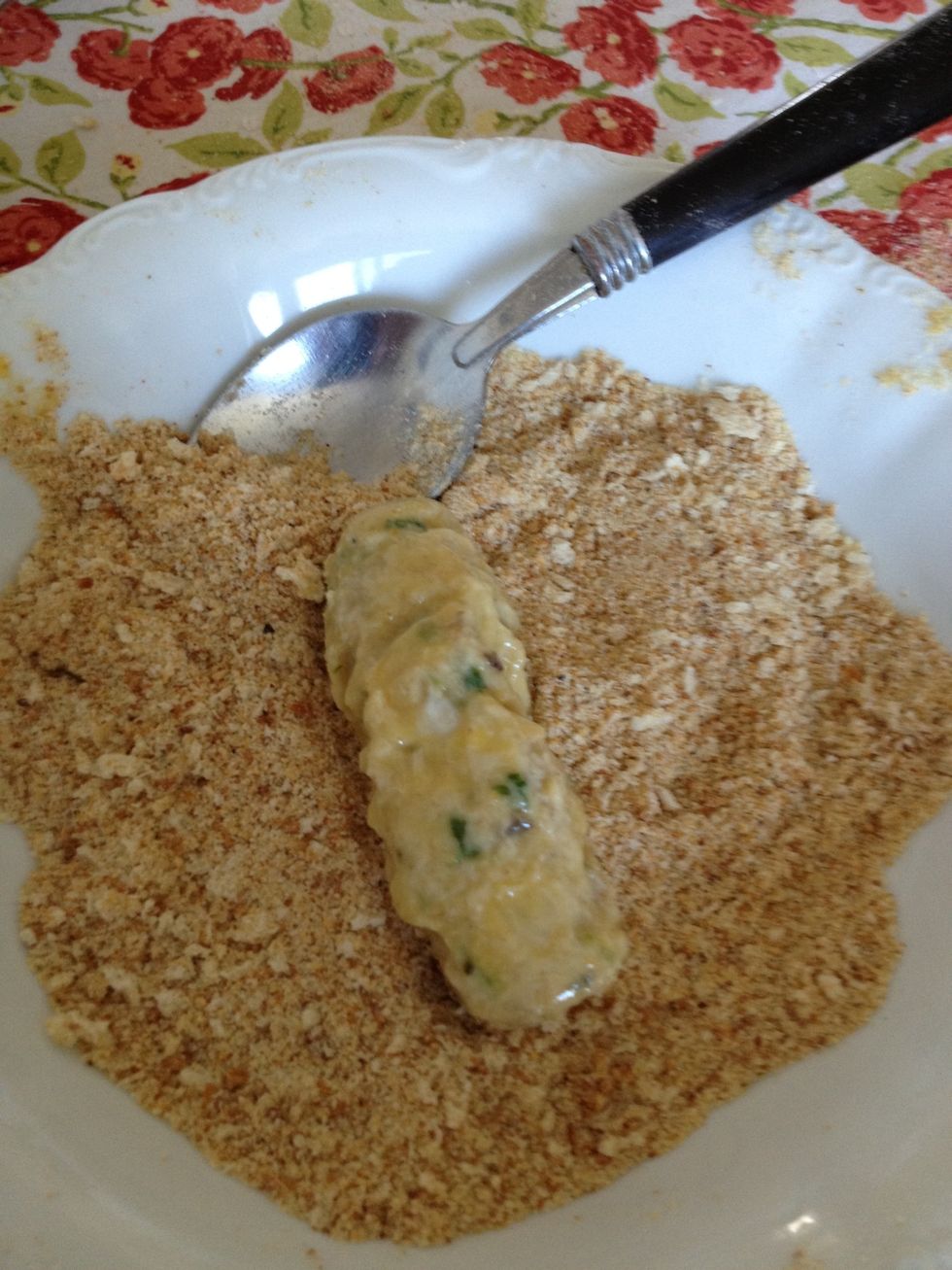 Next put it into the breadcrumb bowl. (Check out my guide on how to make homemade breadcrumbs too!)