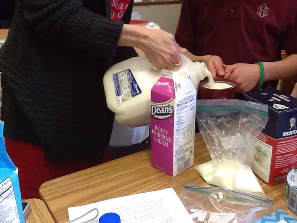 Next, put one cup of milk in the bag.