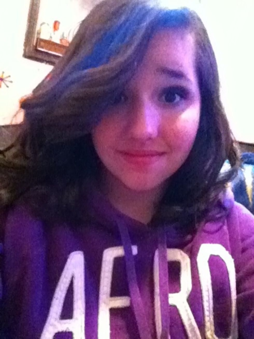 Next put some hair spray on to help hold in the curls